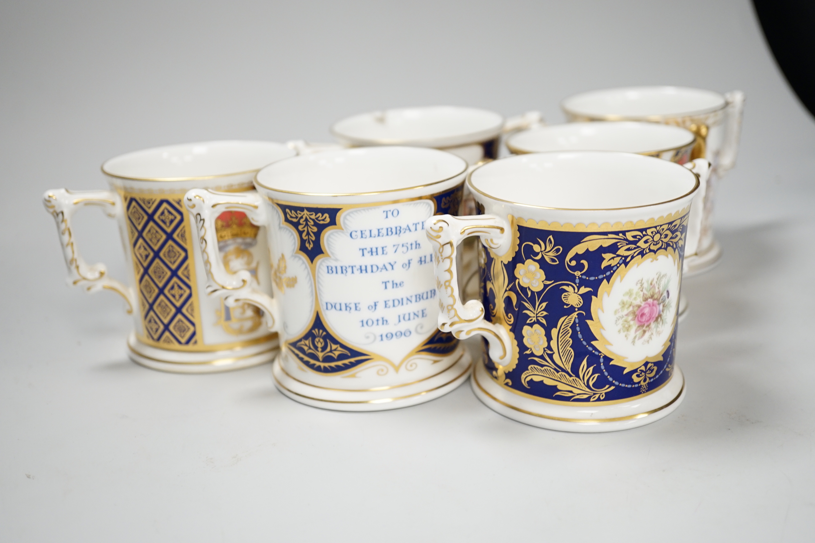 Six Royal Crown Derby Royal commemorative two handled cups